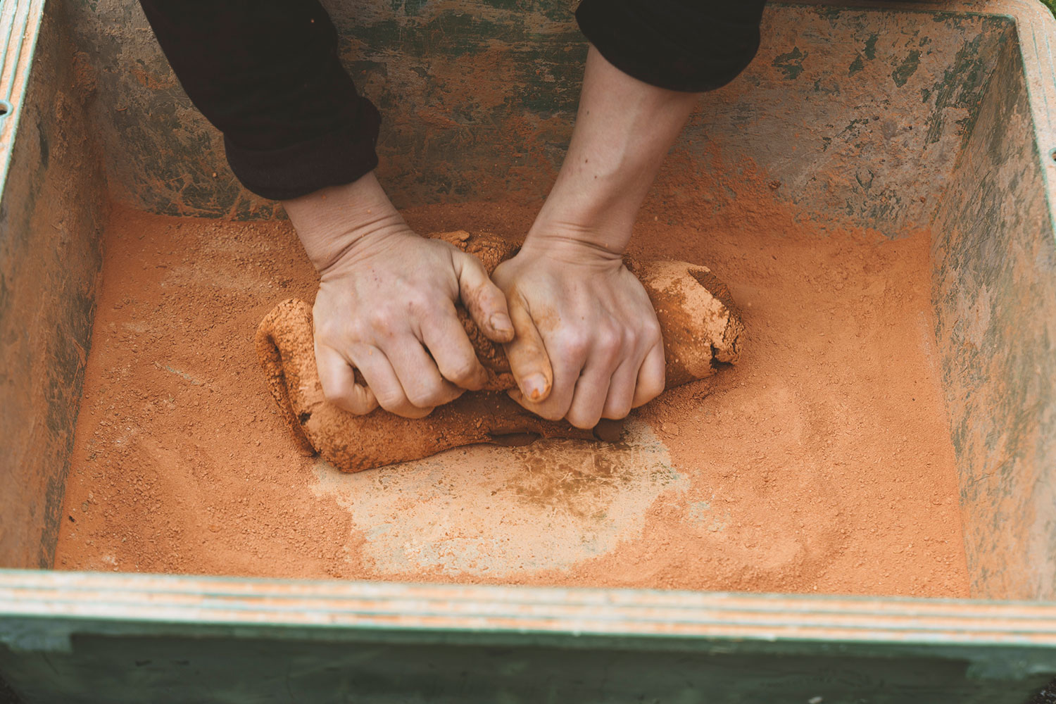 Kneading the clay